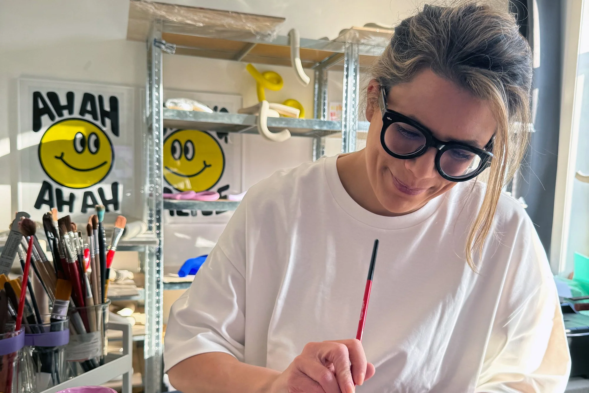 Artist Sina Steiner working in her Rotterdam studio, creating one-of-a-kind sculptural clay artworks by hand.